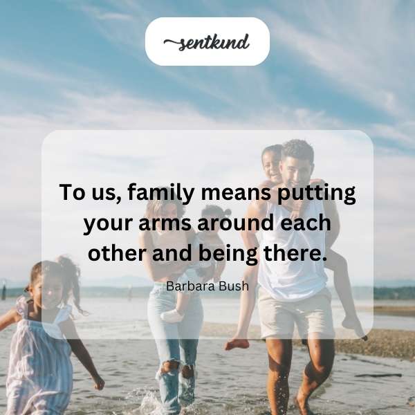 A diverse group of people are embracing tightly in a warm, loving family hug.