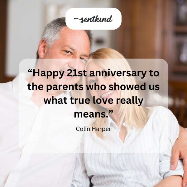 A couple embracing during their 21st anniversary celebration.
