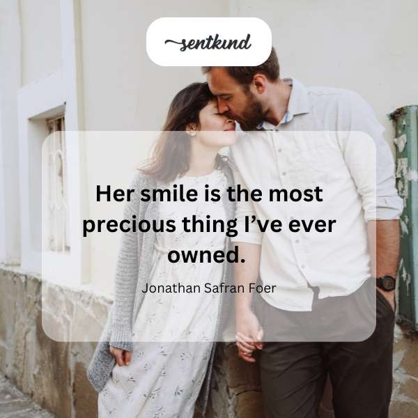A woman with a radiant, heartwarming smile.