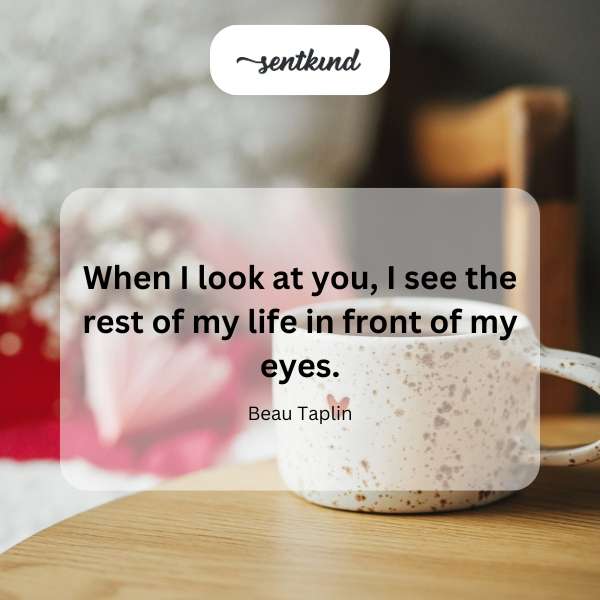 A couple gazes lovingly into each other's eyes, suggesting a deep connection.
