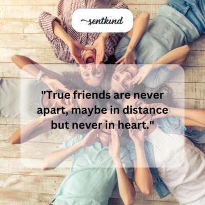 A diverse group of smiling friends raises glasses in a toast around a warm dinner table, celebrating their bond.