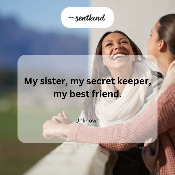 Two young women, sisters, laughing and embracing each other affectionately.