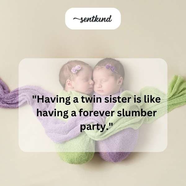 Two young twin sisters are laughing and sharing secrets while sitting on a bed covered with pillows.