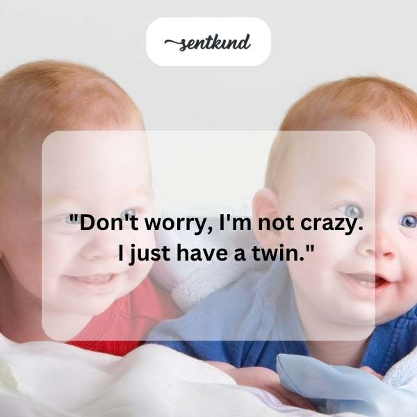 Two identical people standing side-by-side look mischievously at the camera.