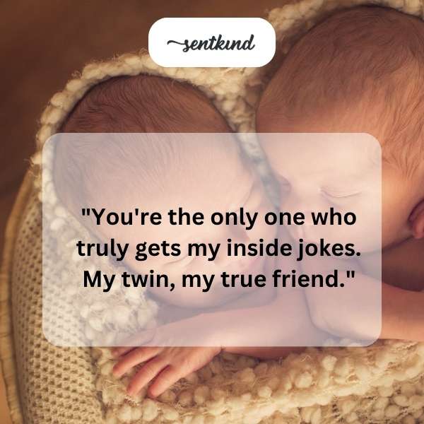 Identical twins laughing together, sharing a private joke.