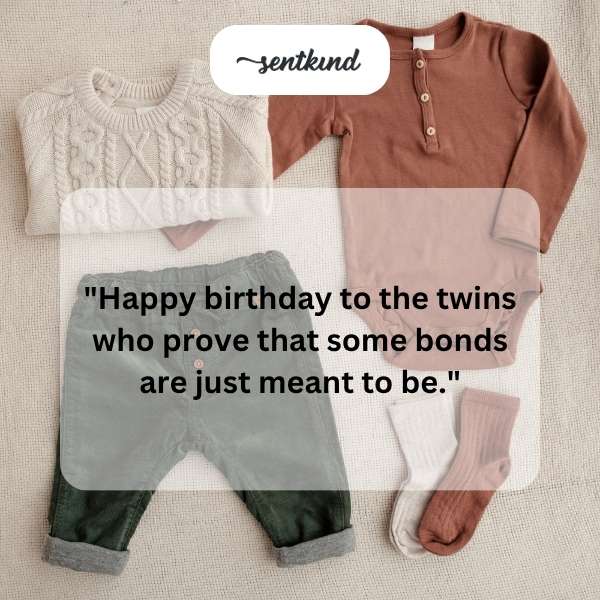 Two young children are smiling and holding hands.