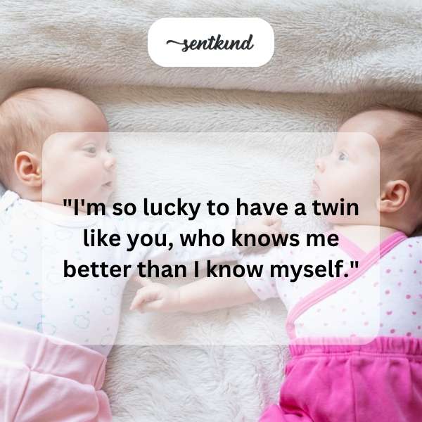 Identical twins smiling and embracing each other warmly.