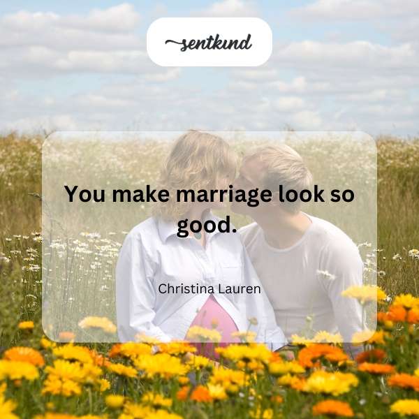 A happy couple embraces affectionately.