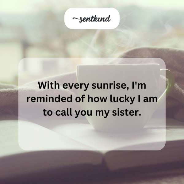 Two sisters stand side-by-side on a hill, silhouetted against a vibrant orange and pink sunrise.