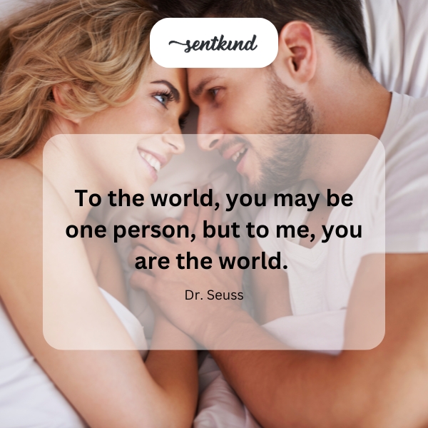 A person holds a small globe in their hands, symbolizing love and connection.