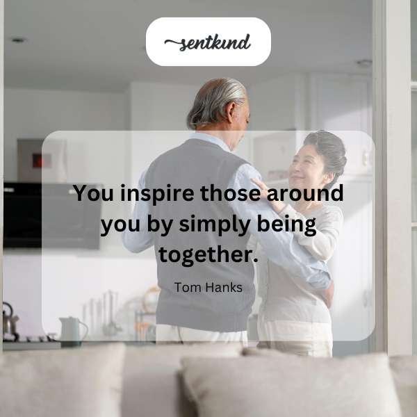 A diverse group of people are smiling and connecting with each other.