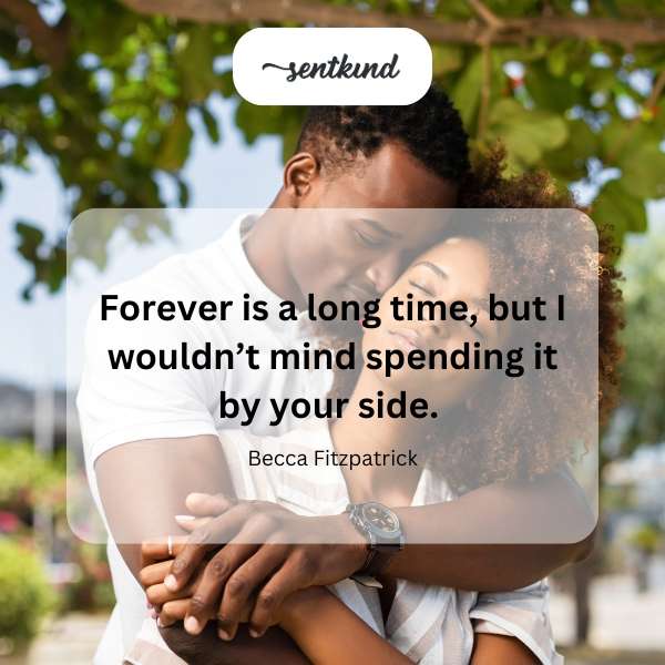 A couple gazes lovingly into each other's eyes, silhouetted against a sunset.