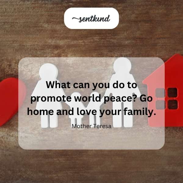 A multigenerational family embraces in a warm, loving hug.