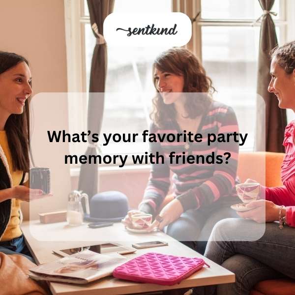 A group of smiling friends enjoys a lively party together, holding up drinks and snacks.