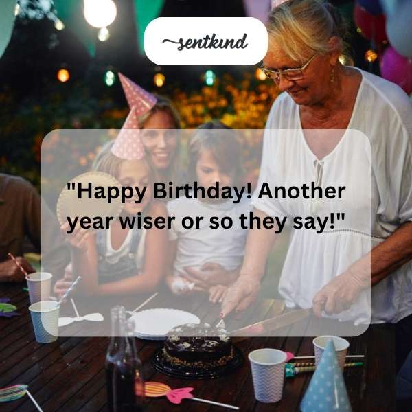 A birthday cake with lit candles and colorful sprinkles.