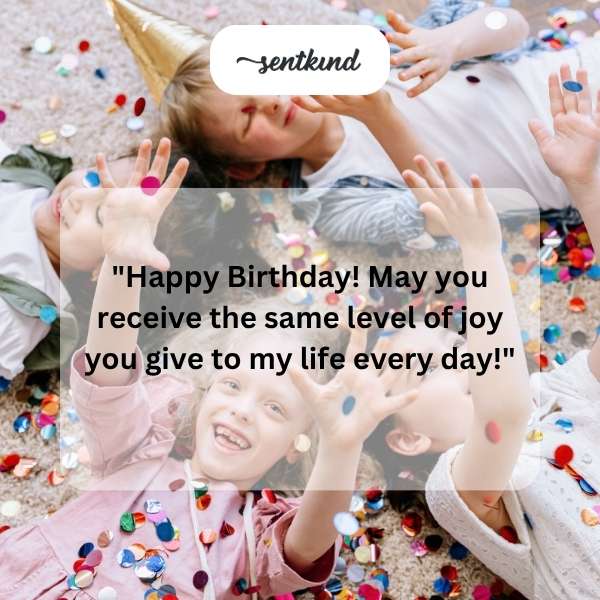 A group of friends are joyfully celebrating a birthday with cake and balloons.