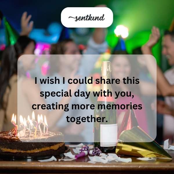 A single lit candle glows softly against a dark background.