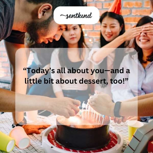 A person is smiling while holding a dessert.